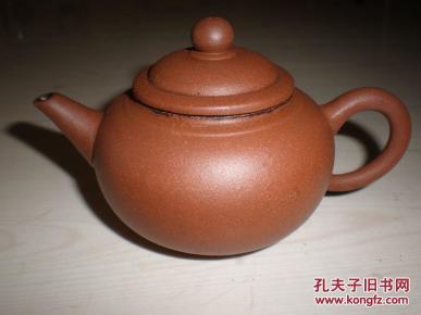 如何分辨紫砂壶是不是纯手工 pYYBAFUaDMeALi78AAGfyhVBgXc638_n.jpg