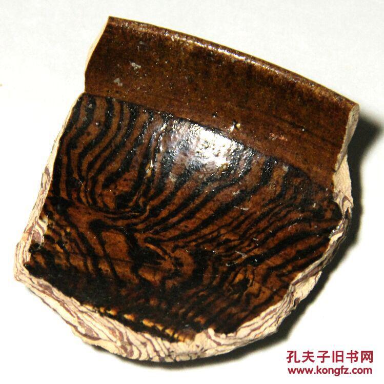 此件瓷片应为唐代搅胎瓷钵碗的碎片,具有较高的研究价值