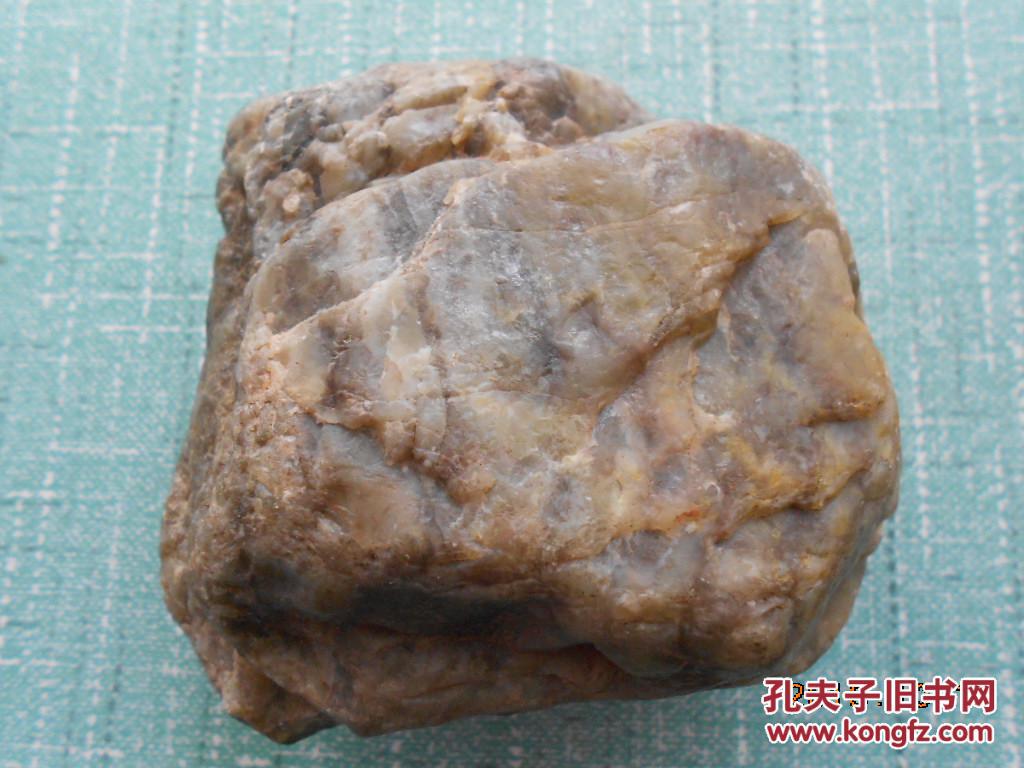 一块经过多年河流冲刷的树化玉原石约1斤(玉化程度高)