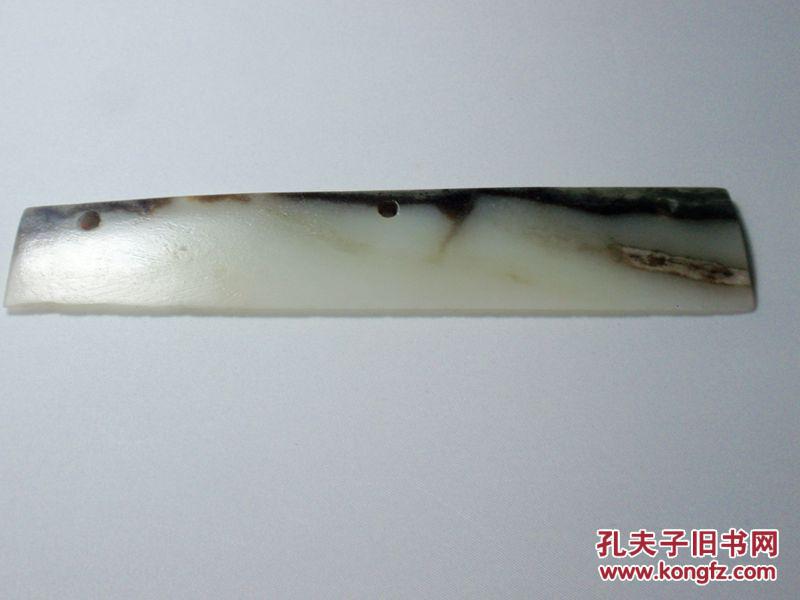 三孔玉刀(齐家文化 约公元前2200年至公元前1600年) 此藏品标明的年份