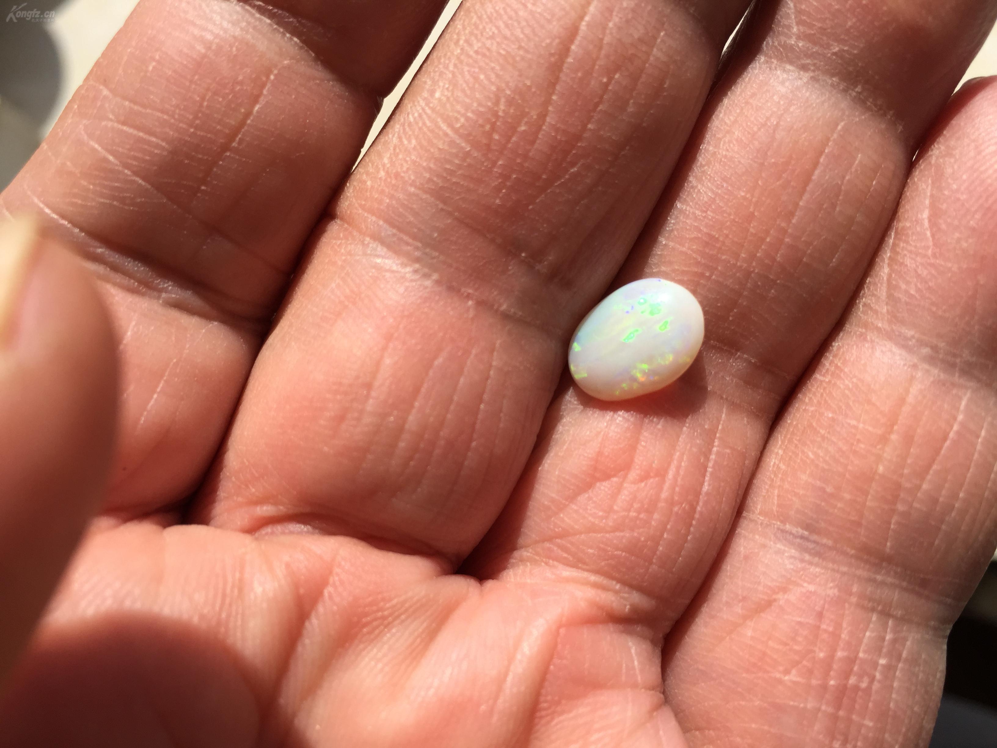 来自澳大利亚欧珀30ct白色欧珀戒面11