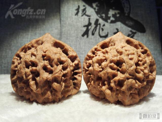 《50mm麒麟纹大官帽文玩核桃一对》配对精确,品相好!