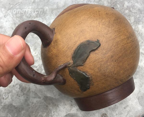 蒋蓉制寿桃倒流紫砂壶