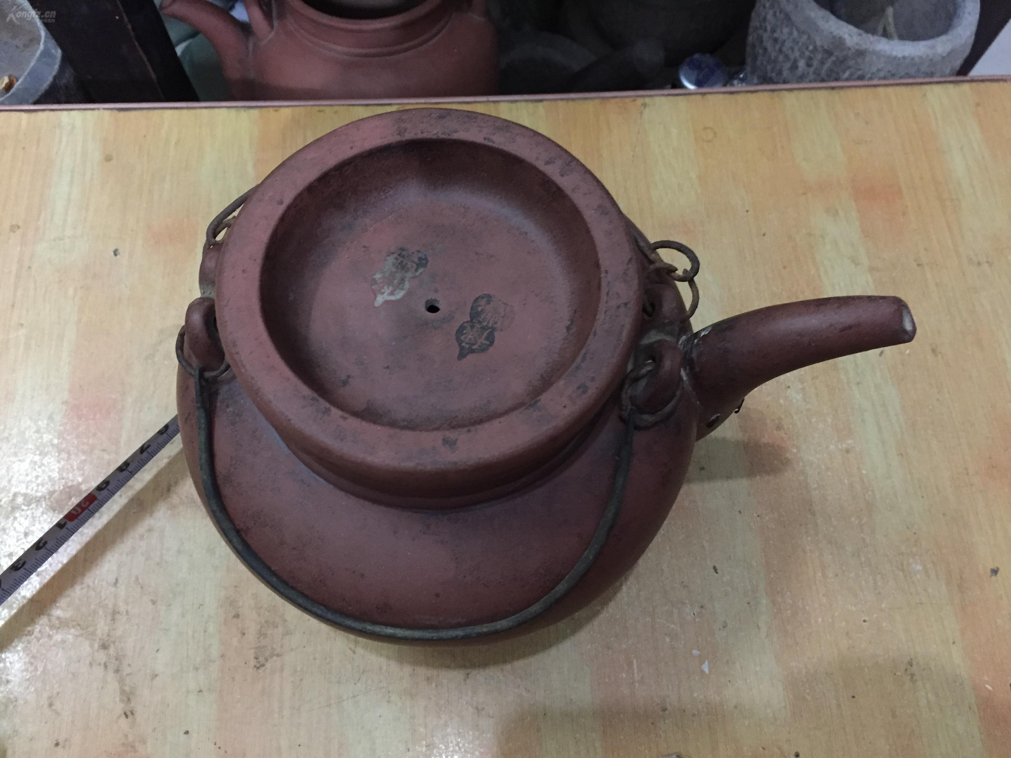 清朝时期的提梁紫砂壶包老