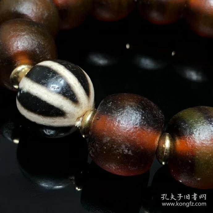 回流明清时期皇室御用老琉璃八线天珠手串尺寸:19*15mm,天珠直径20mm