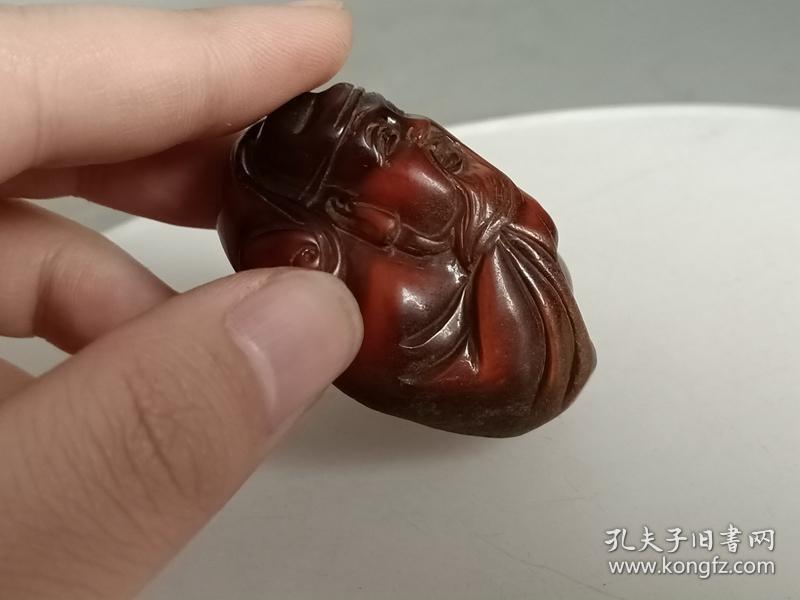 清代传世雕工不错的蜜蜡财神手把件