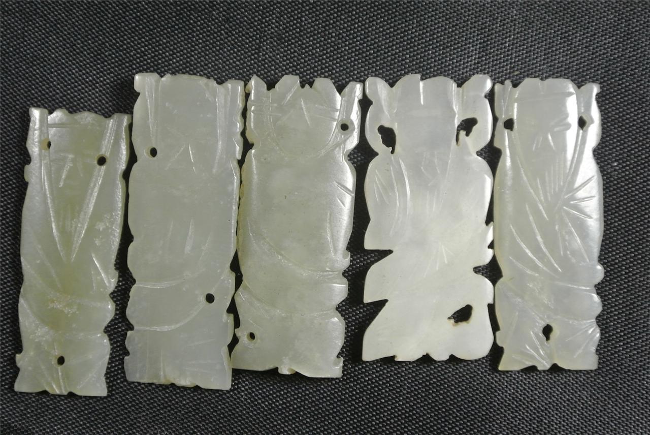 最神秘的的人面纹薄玉片10片,有谁知道何种用途否?英国回流