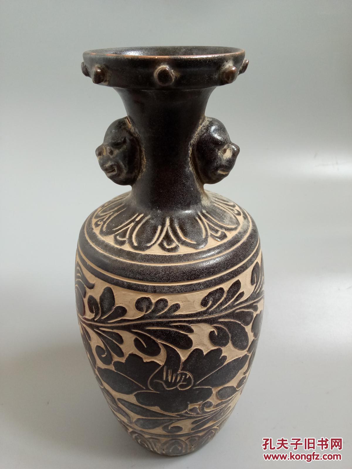 唐代定窑缠枝花卉瓷瓶高27厘米 拍品编号:26978004