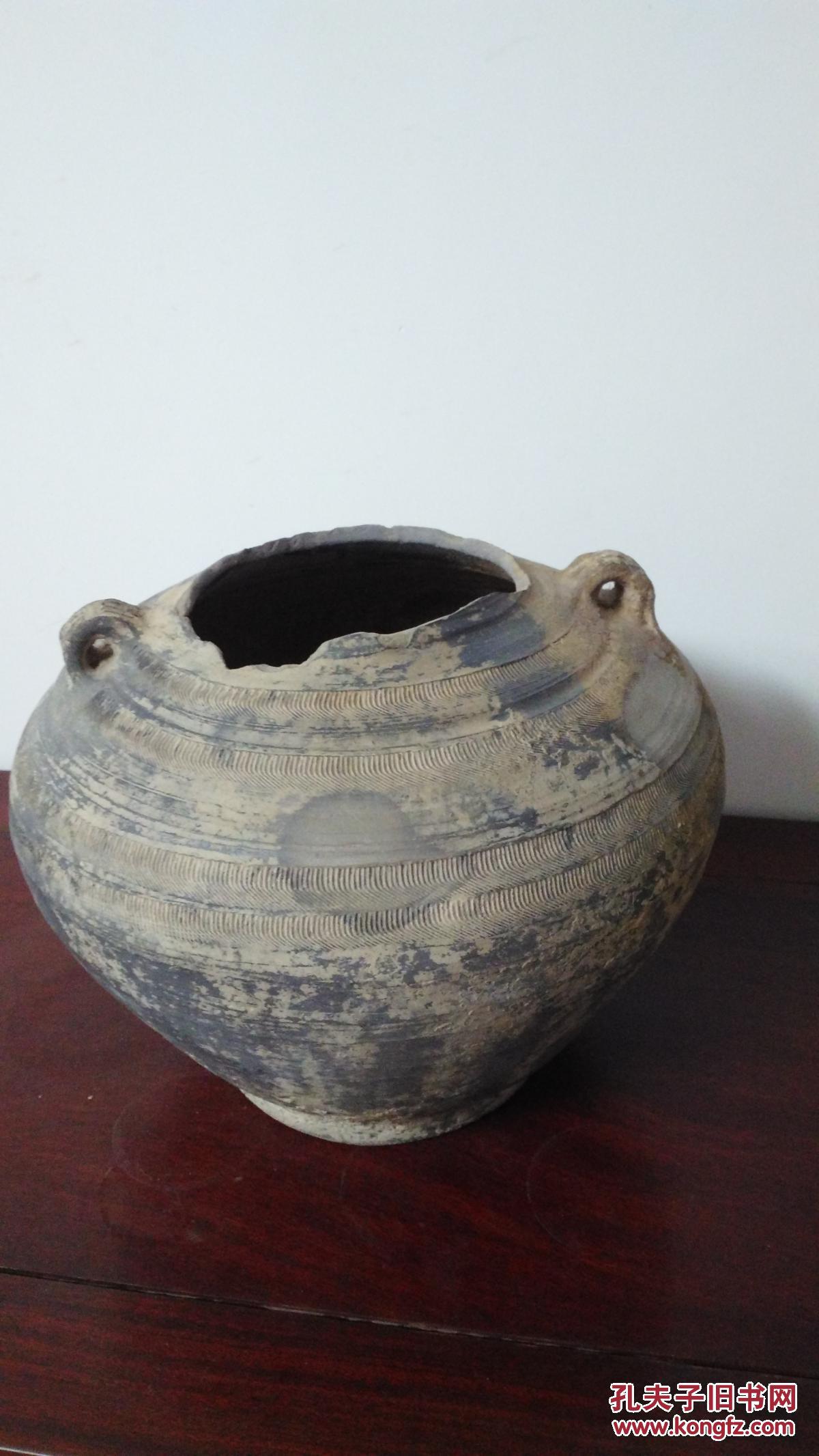 战国大黑陶罐,旋纹精美.惜残