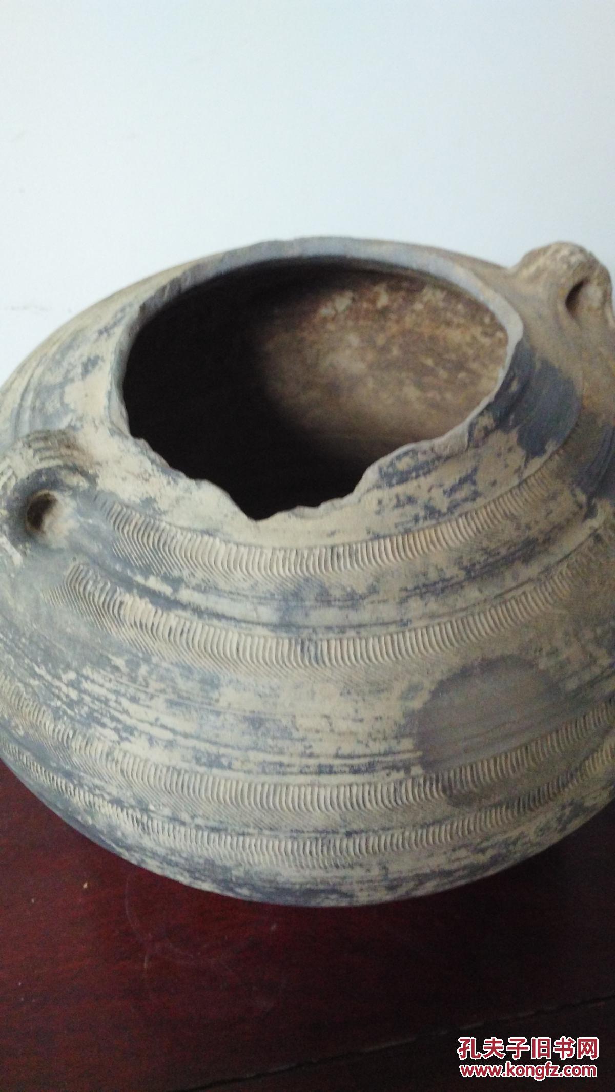 战国大黑陶罐,旋纹精美.惜残