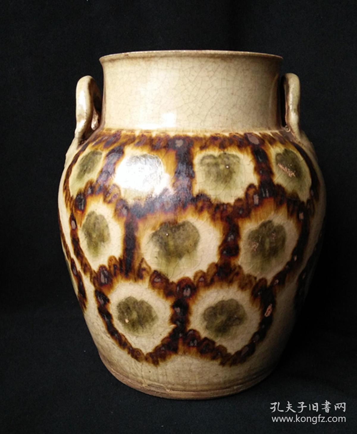 唐代长沙窑褐绿彩几何框纹双系罐