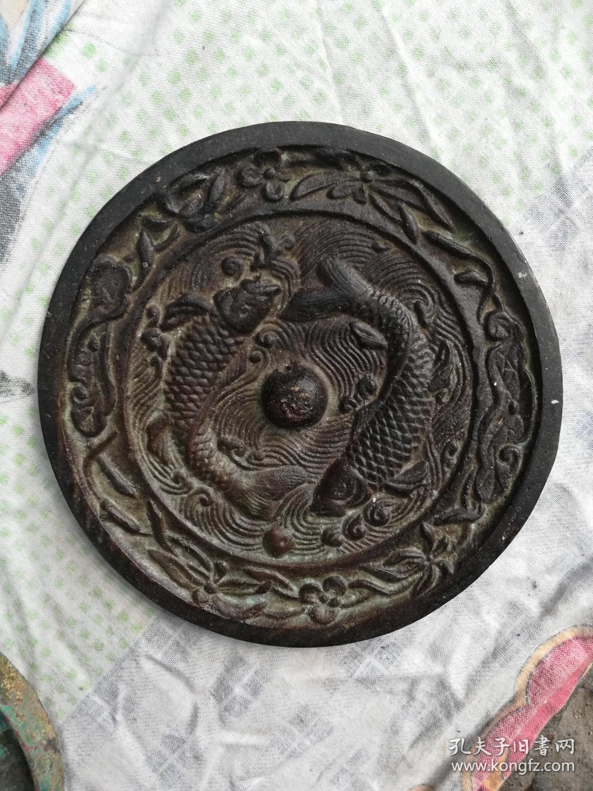 铜镜;双鱼纹饰{宋金代表图案