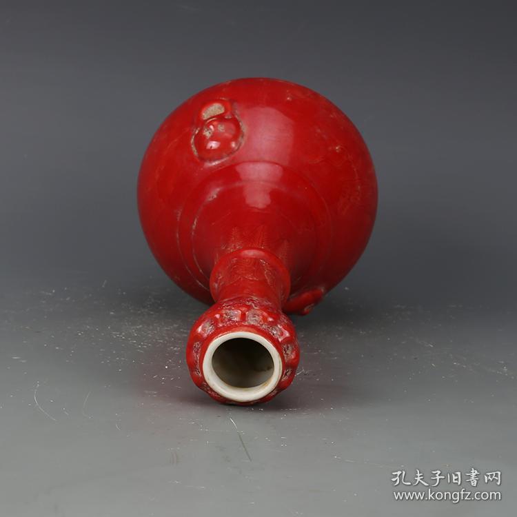 明弘治红釉雕刻麒麟纹蒜头瓶