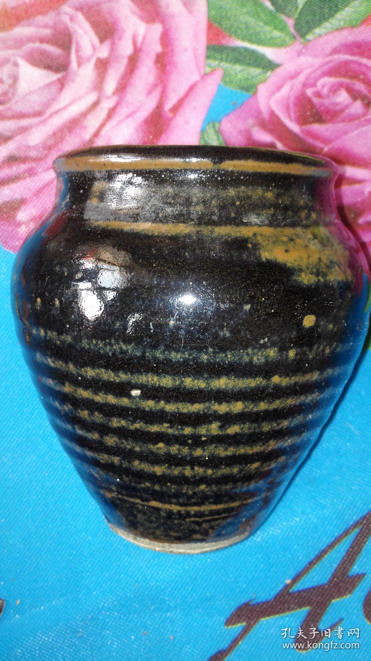 元代黑釉瓷罐 元代黑釉瓷罐.高14.1厘米.肚直径13.5厘米.口直径10.