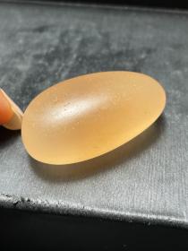 宝石光，稀有粉色宝石光原石，精品地表料黄色宝石光，稀有，珍贵，“黄金粉色宝石光”宝石级21克重，完美，难得“肉质油润 颜色非常俏丽 形状饱满厚实 肉质细腻，手感细腻光滑，颜色漂亮，打灯透光，值得永久收藏