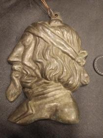 铜人物头像，重631g.年代未知，不知造像是谁。挺厚的。