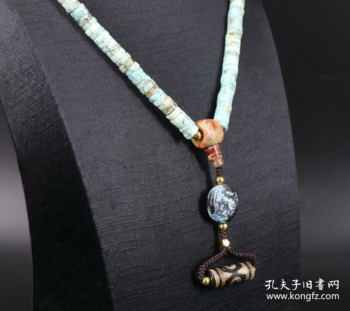 伟德bv1946官网-佛珠搭配中的“点睛之笔”——背云