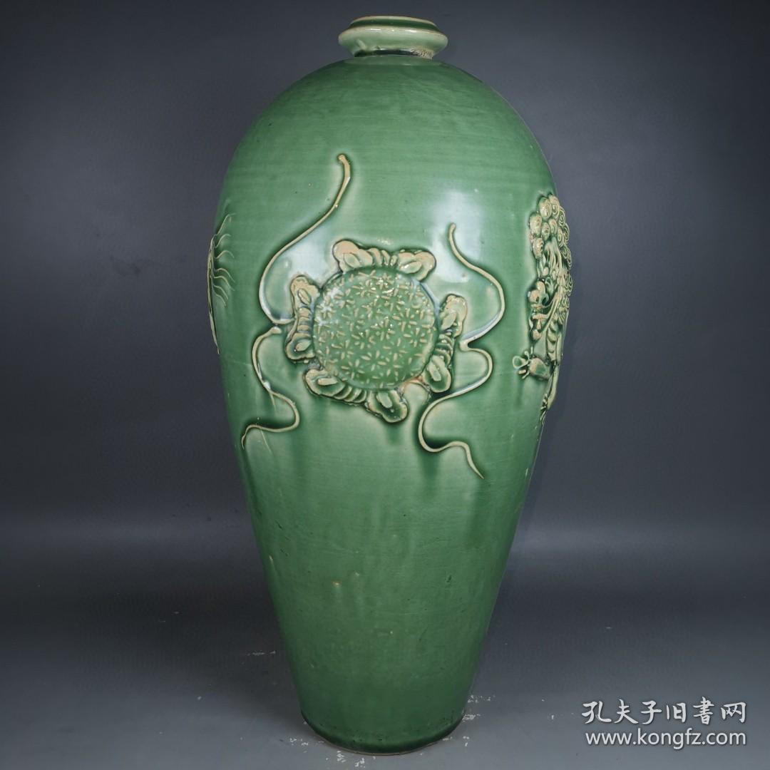 宋代吉州窑绿釉雕工狮子纹梅瓶,釉色饱满温润 工艺复杂精湛. 1p