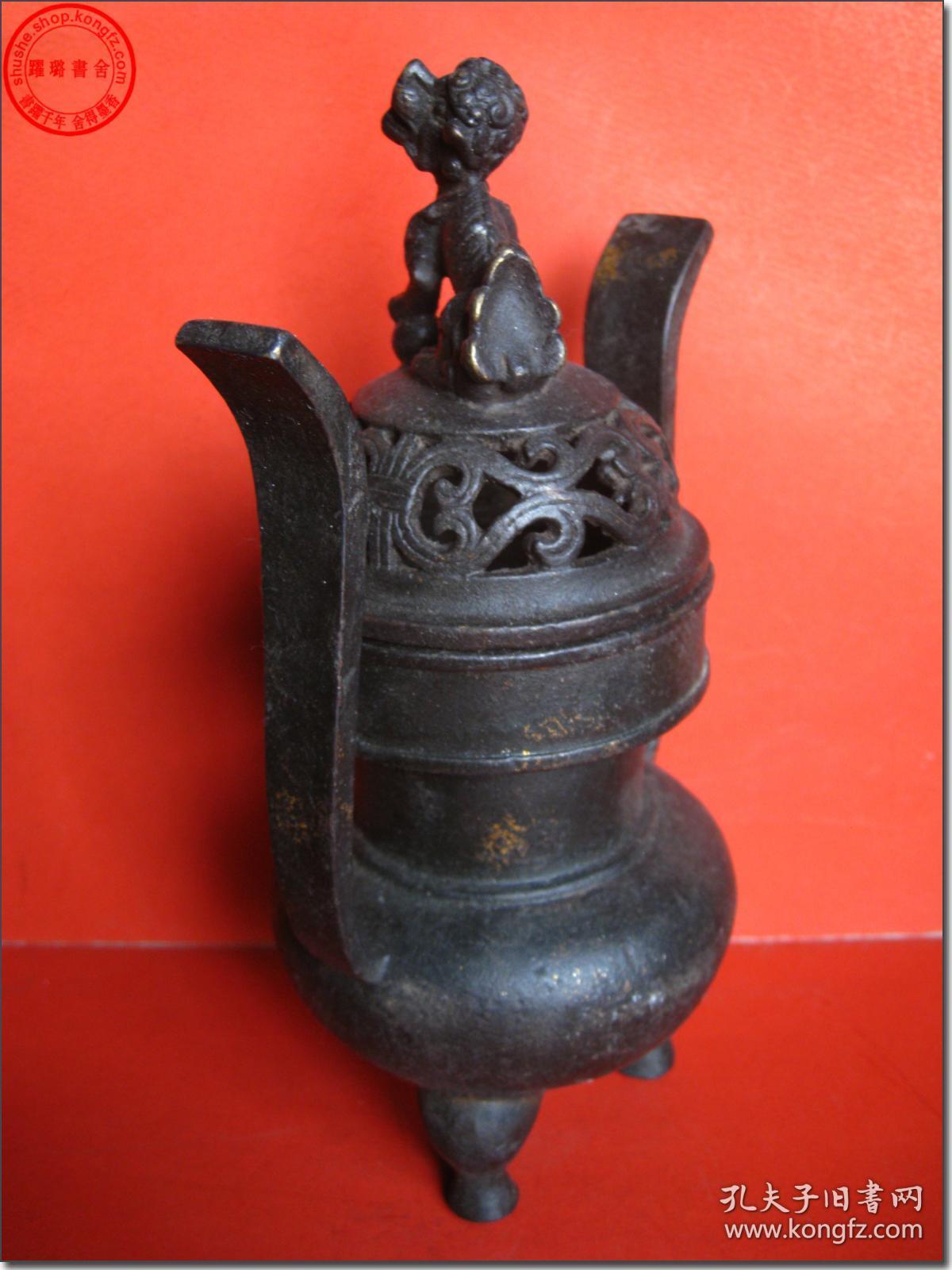 【图】【大明宣德年制铜香炉】,圆鼎形,三足双桥耳,顶带狮子纽镂空盖,