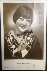 【明星玉照】民国时期美国著名华裔女星黄柳霜女士(Anna May Wong)半身像照片一张，服装头饰颇具美国1920-30年代潮流风尚。背面明信片格式，品质颇佳