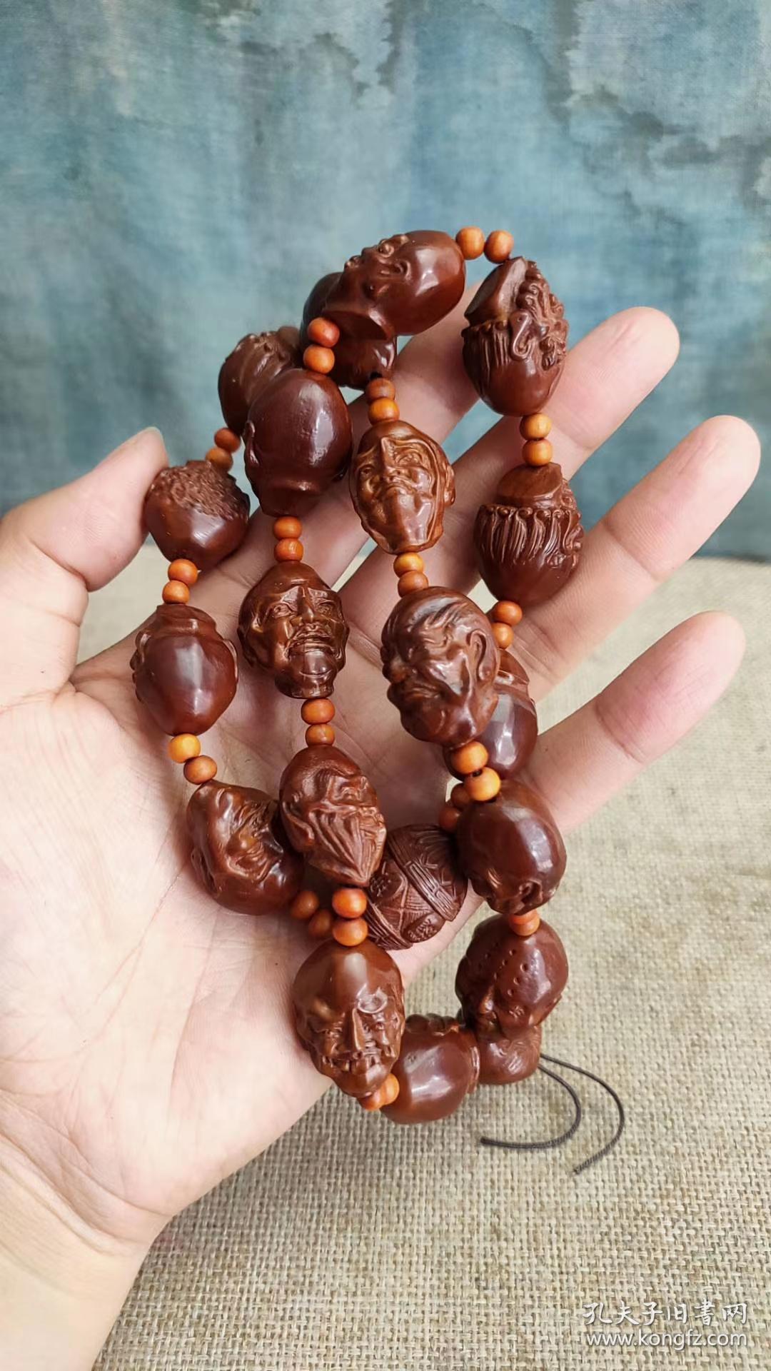 把玩多年老橄榄核十八罗汉真漂亮,雕工精细
