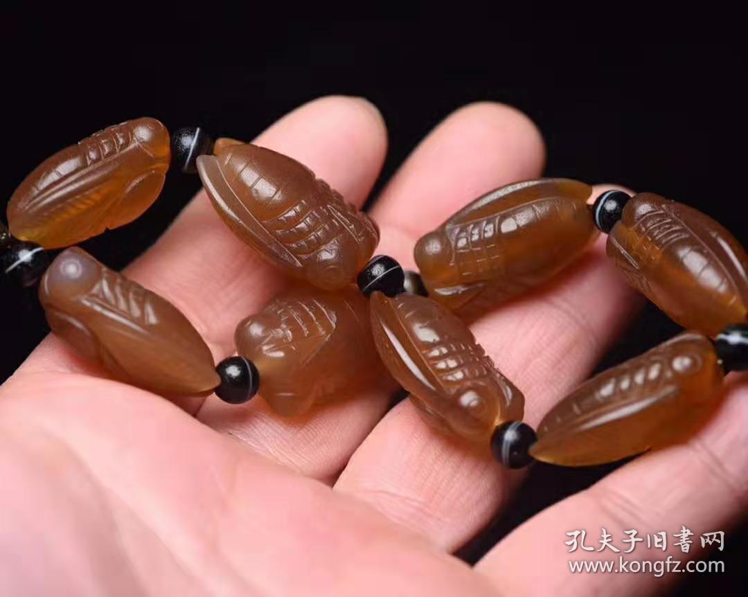 玛瑙蝉手链规格: 单个2.7×1.7×1.2厘米 重 54克